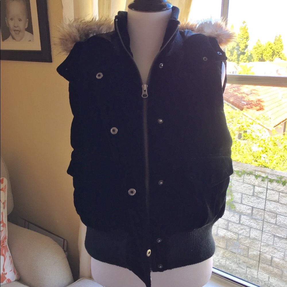 Luxury padded velvet vest with fur lined hood..